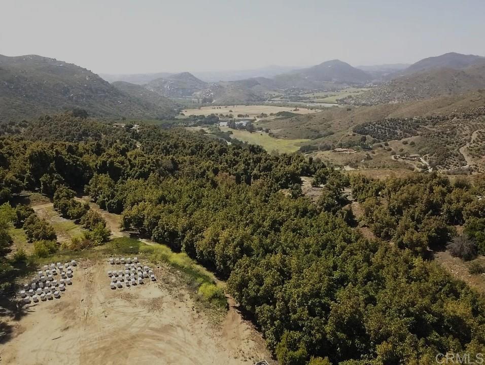 33444 Couser Canyon Road Valley Center, CA 92082 - Photo 2 of 11 a view of a field with a mountain in the background