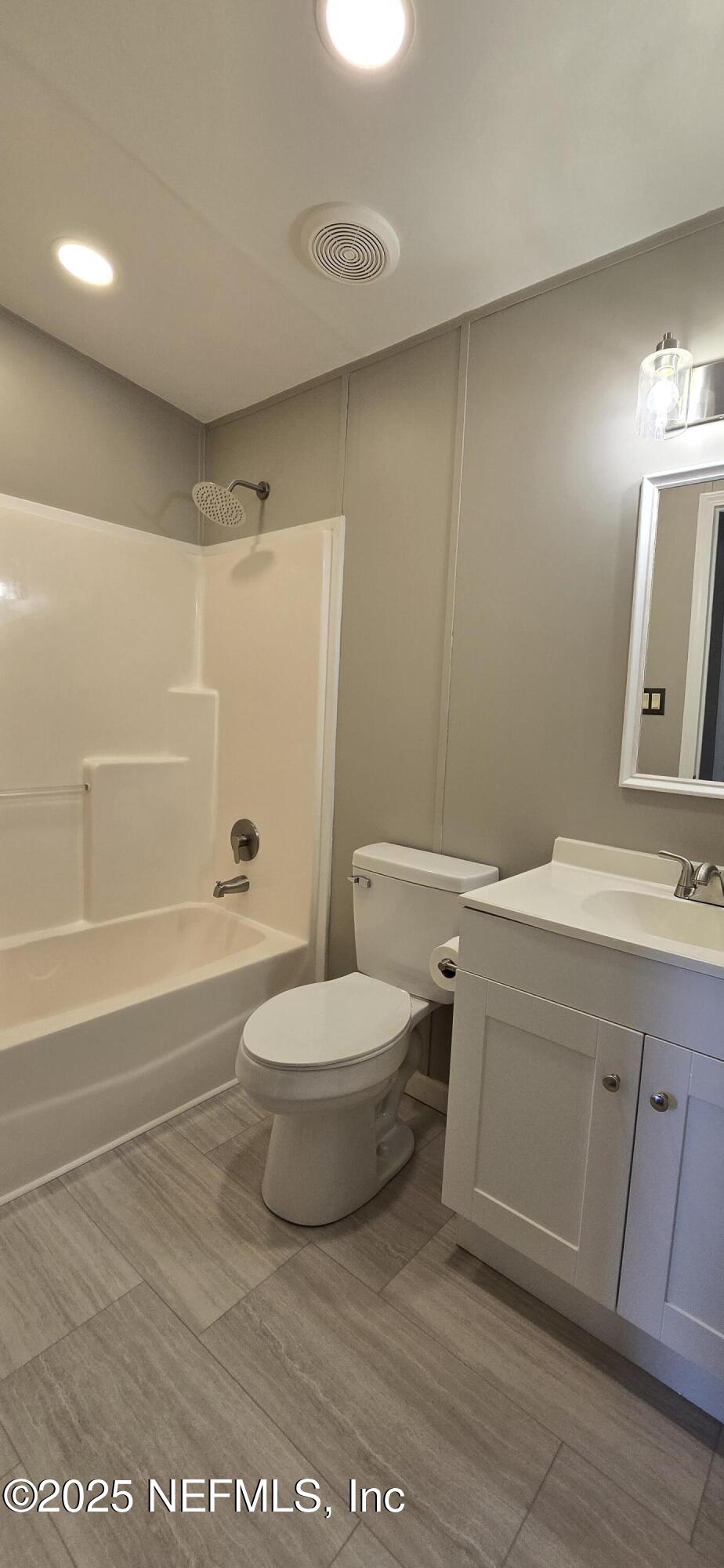 45028 Musslewhite Road Callahan, FL 32011 - Photo 15 of 18 a bathroom with a sink a toilet and shower