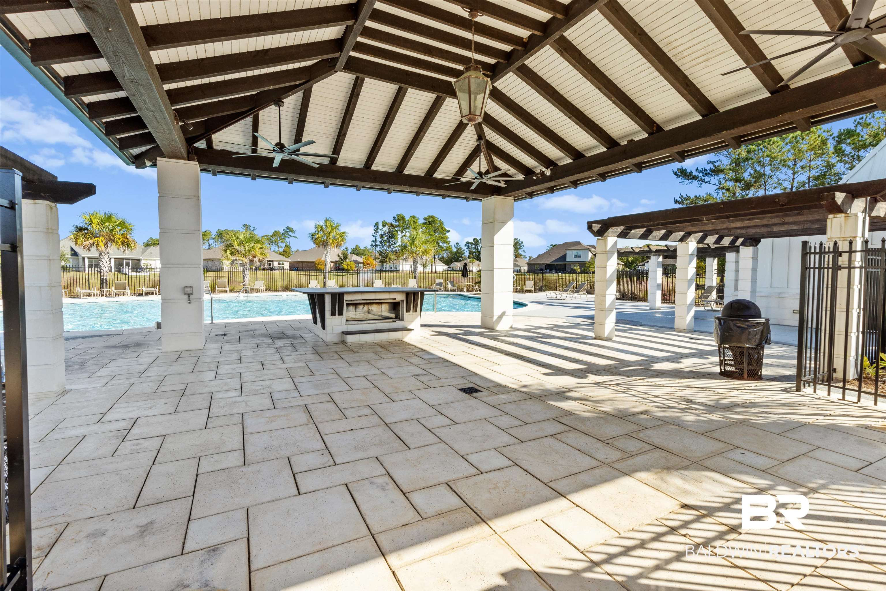 485 Shepard Street Gulf Shores, AL 36542 - Photo 47 of 53 View of patio with a community pool and a ceiling fan