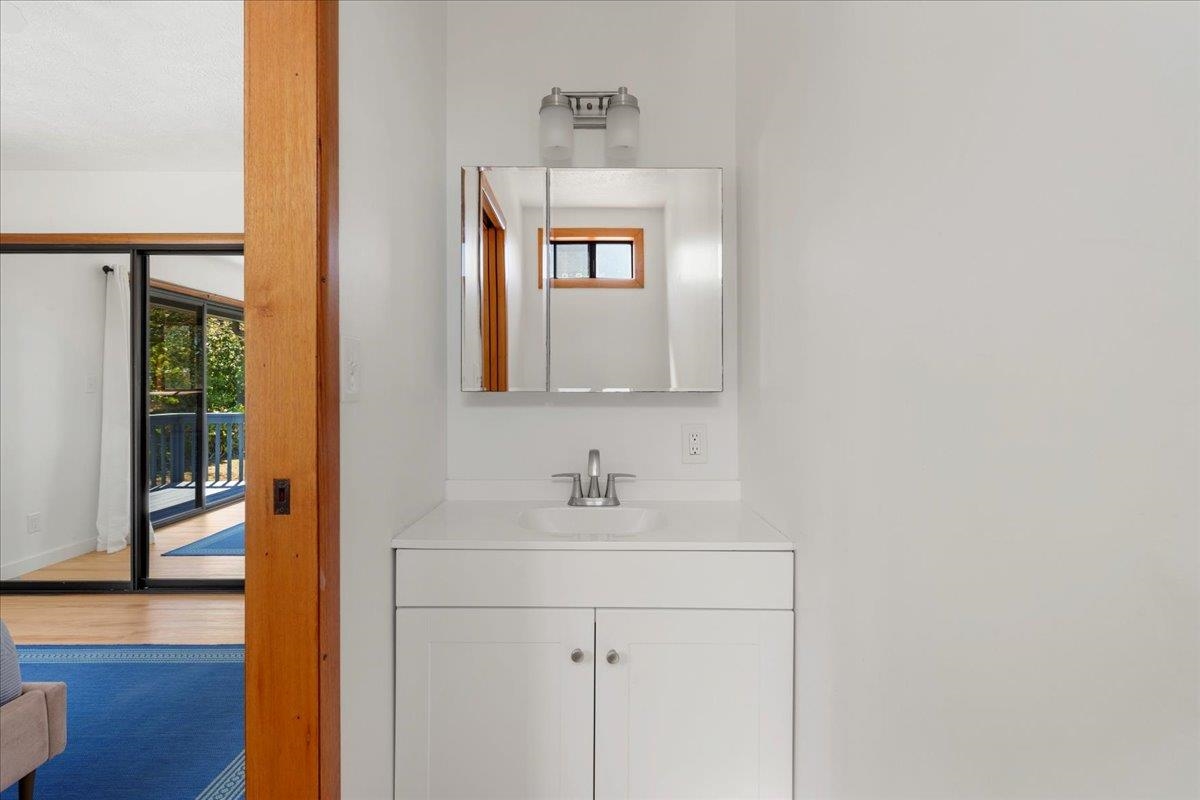 2130 Kauhikoa Road, Unit A Haiku, HI 96708 - Photo 32 of 43 a bathroom with a sink and a mirror