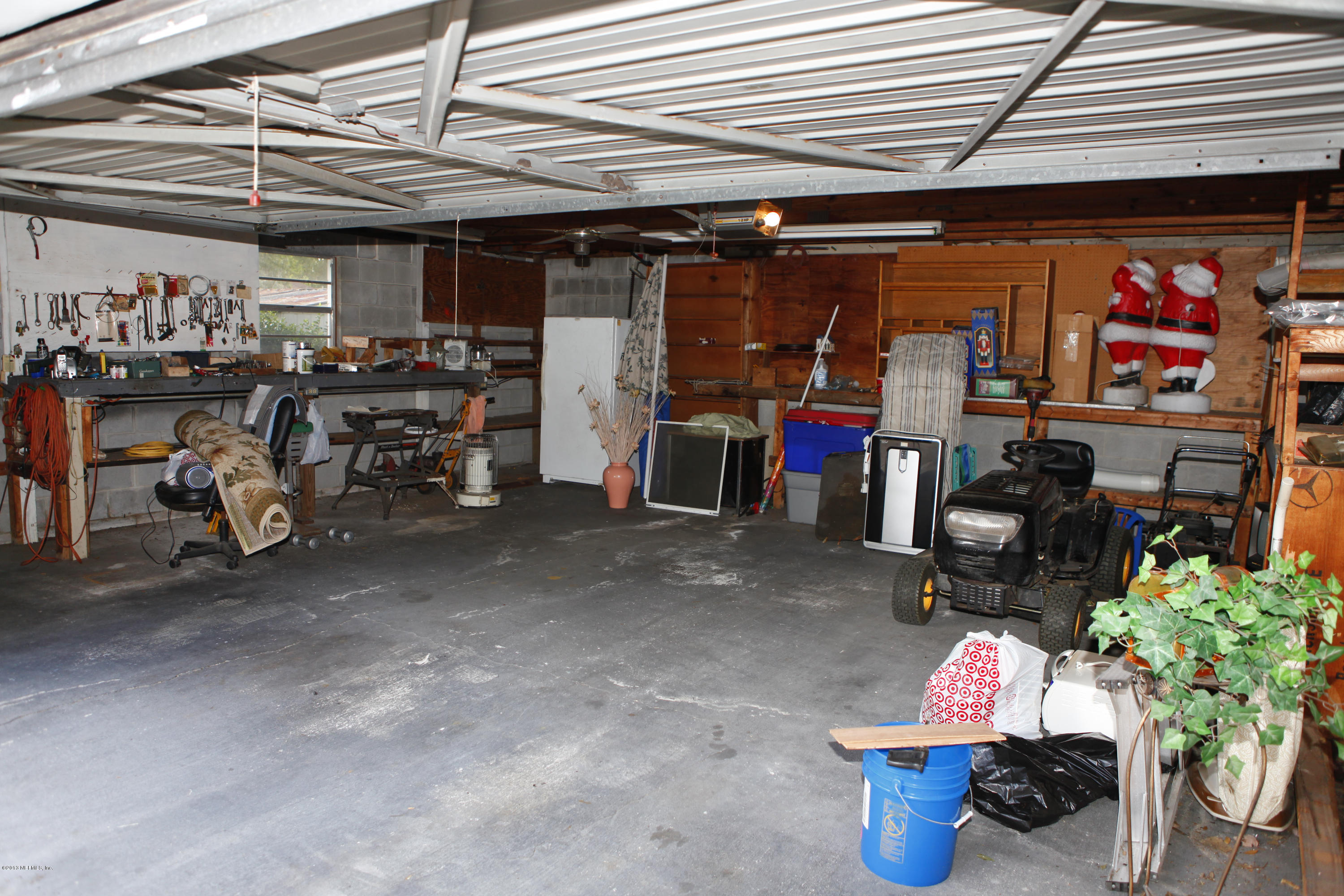 13715 Fario Road Jacksonville, FL 32224 - Photo 22 of 30 Garage w/ work top space