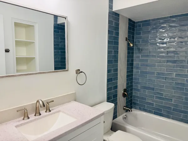a bathroom with a sink and a bathtub