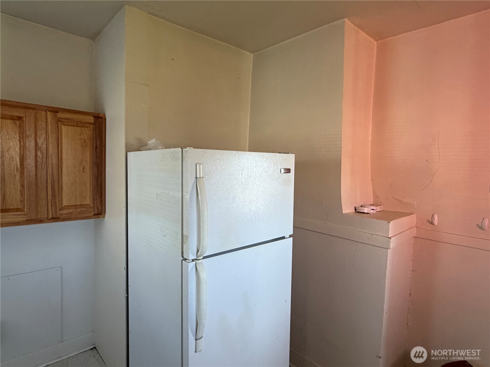 3101 Sumner Avenue Hoquiam, WA 98550 - Photo 18 of 21 a white refrigerator freezer sitting in a kitchen