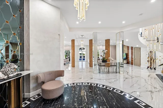 a kitchen with stainless steel appliances granite countertop wooden floor and large windows