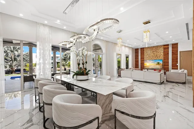 a spacious bedroom with a bed and a large mirror