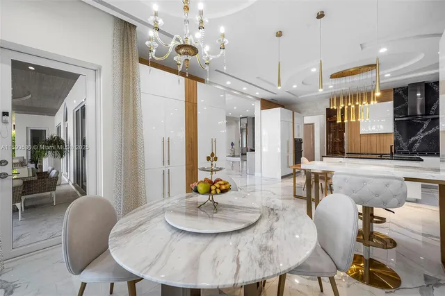 a view of a swimming pool with outdoor seating and yard