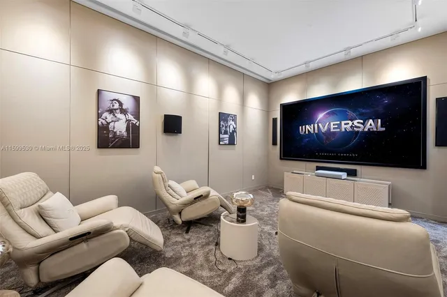 a view of a house with swimming pool and sitting area