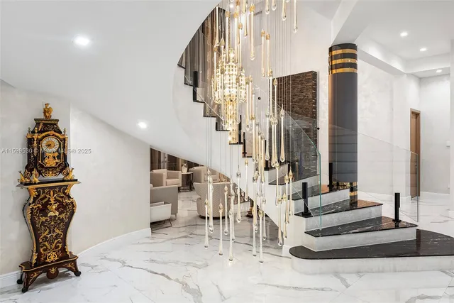 a bathroom with a sink shower and a mirror
