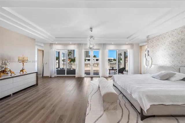 a view of walk in closet and bedroom