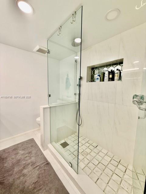 1100 Alton Road, Unit 4D Miami Beach, FL 33139 - Photo 25 of 39 a bathroom with a shower and a glass shower