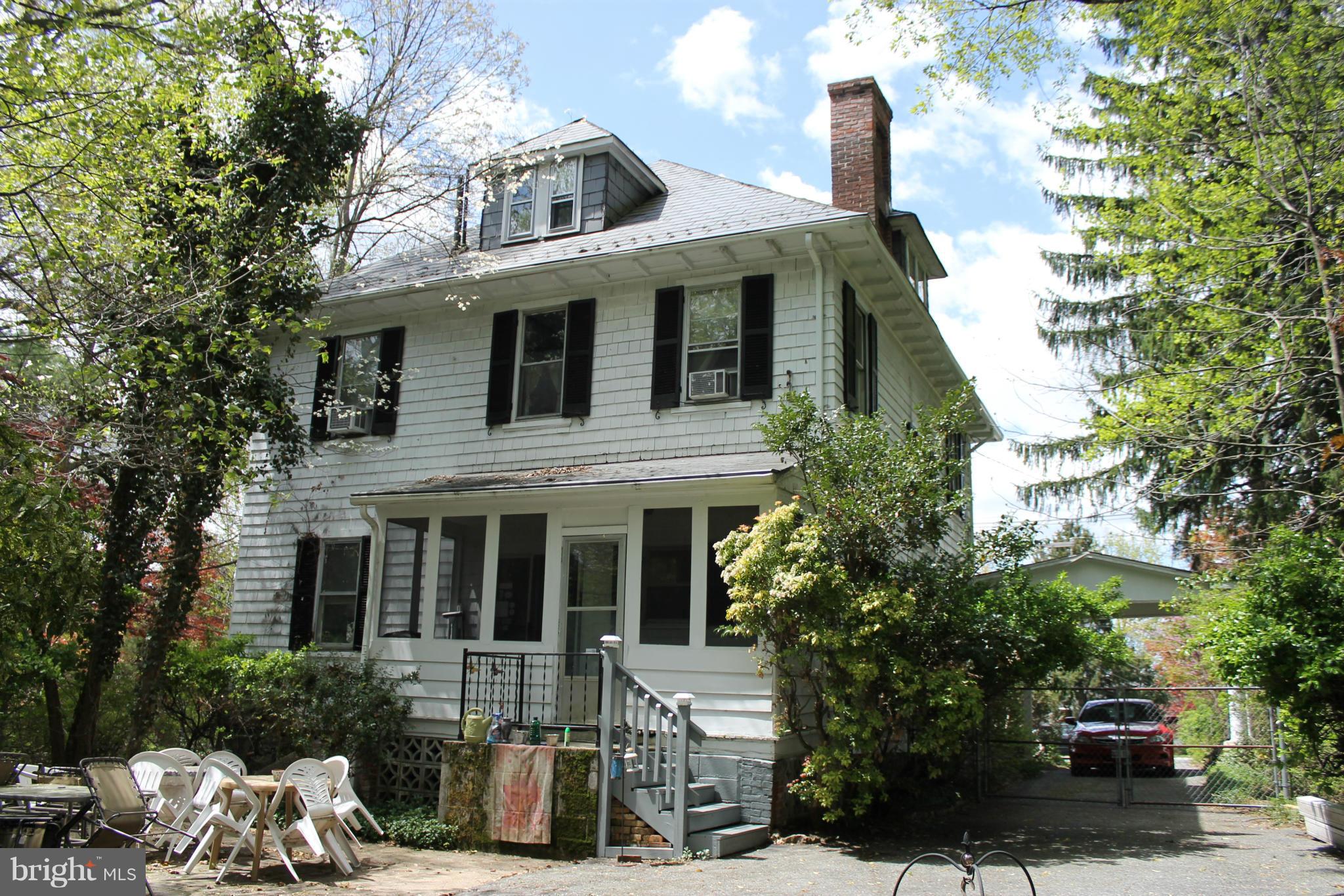 23 North Rolling Road Baltimore, MD 21228 - Photo 3 of 30 a front view of a house with a yard