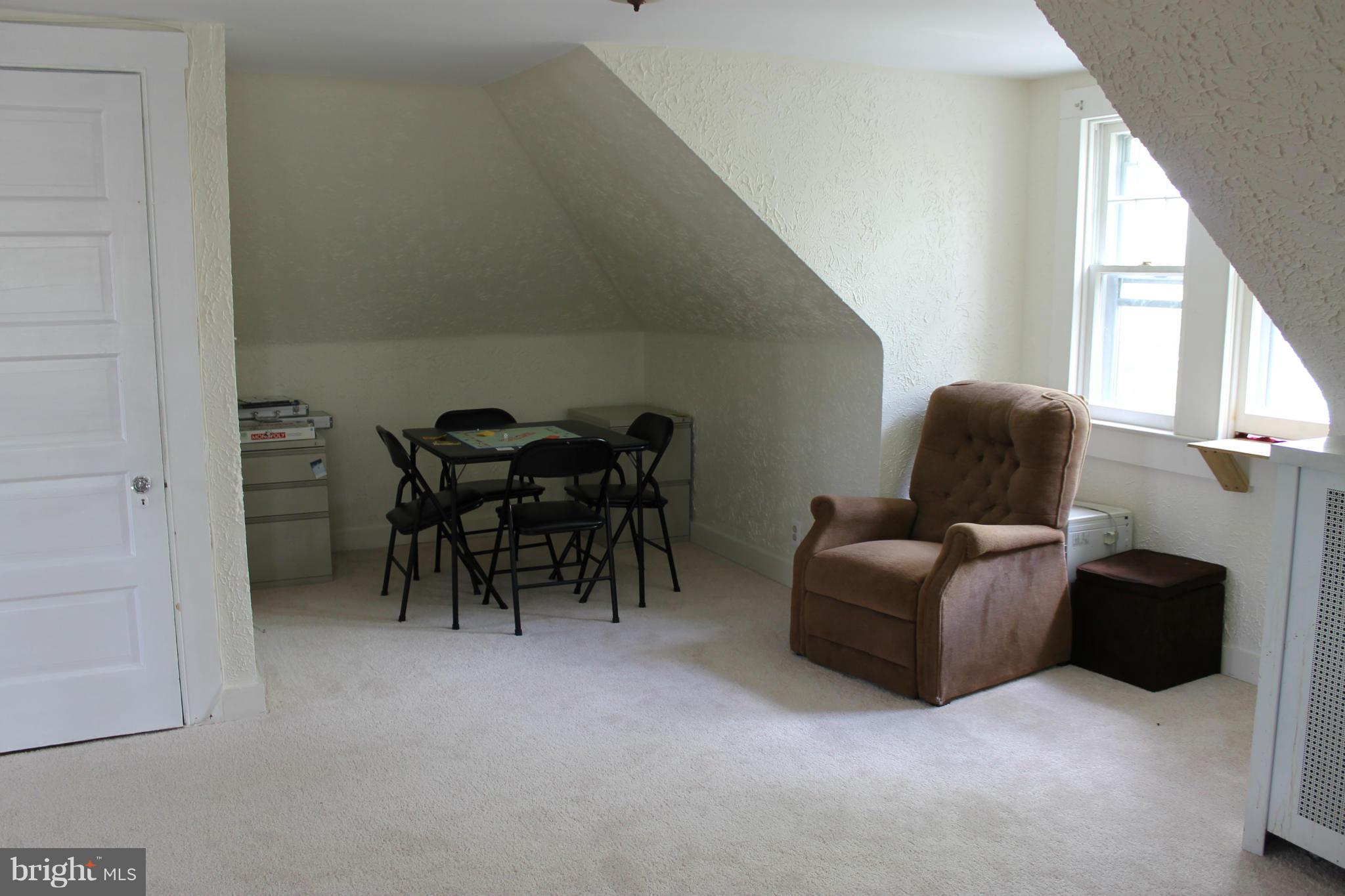 23 North Rolling Road Baltimore, MD 21228 - Photo 22 of 30 a livingroom with furniture and window