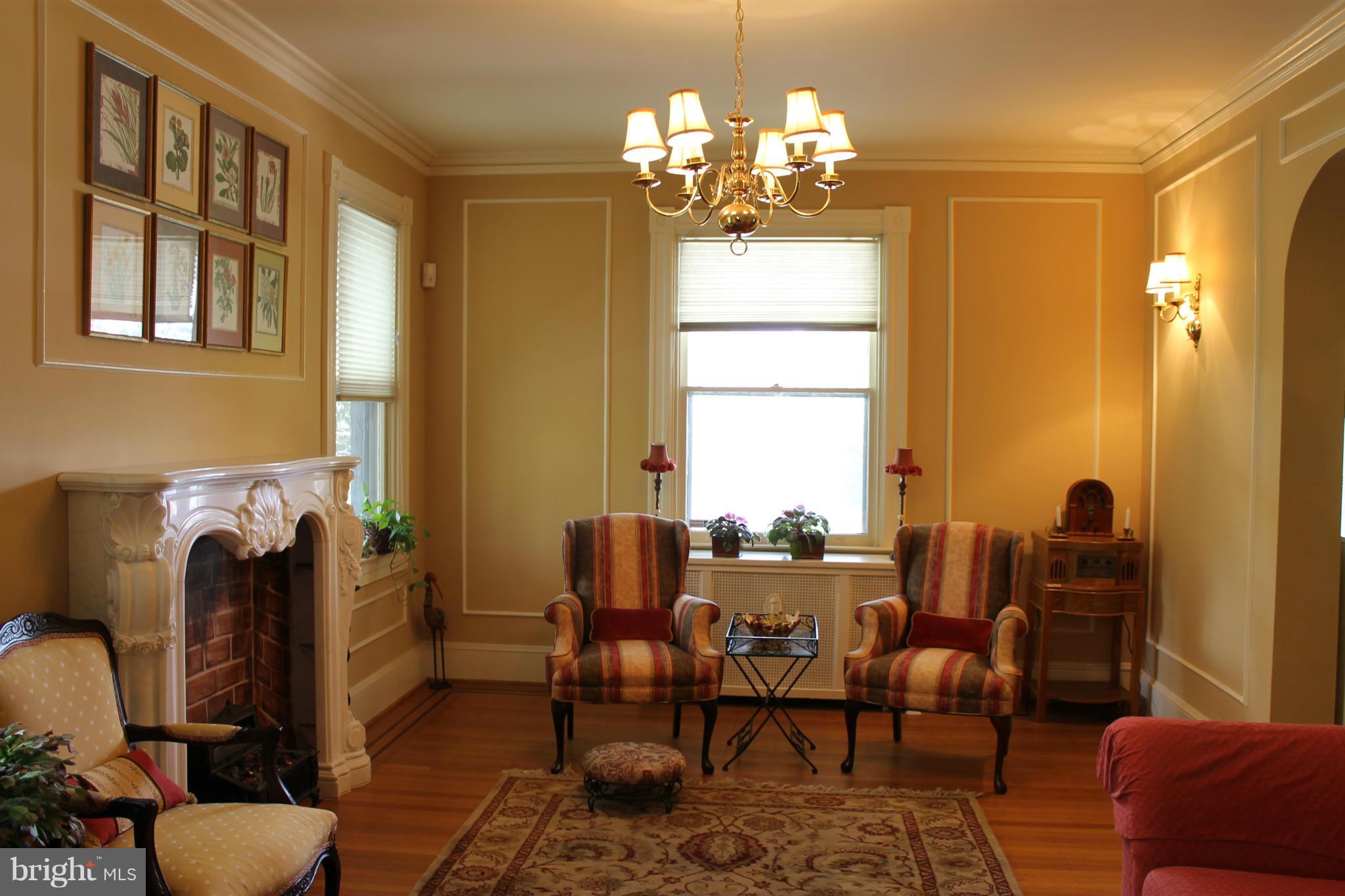 23 North Rolling Road Baltimore, MD 21228 - Photo 8 of 30 a dining room with furniture a chandelier and window
