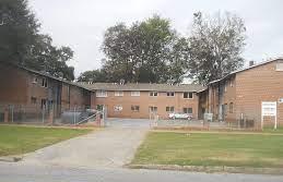 502 2nd Avenue, Unit 4 Columbus, GA 31901 - Photo 1 of 1 a backyard of a house with table and chairs
