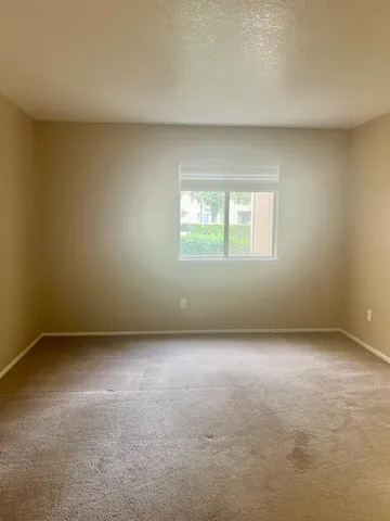 a white stove top oven sitting inside of a kitchen