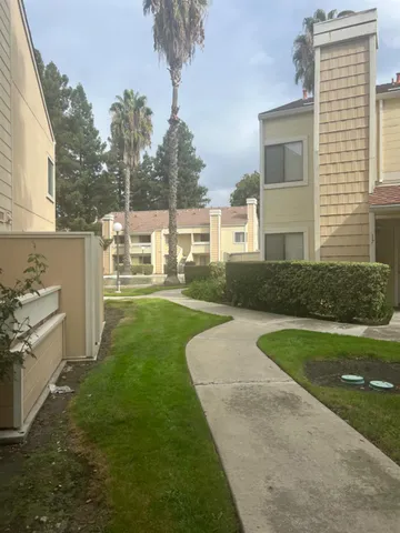 a view of a lake with a big yard