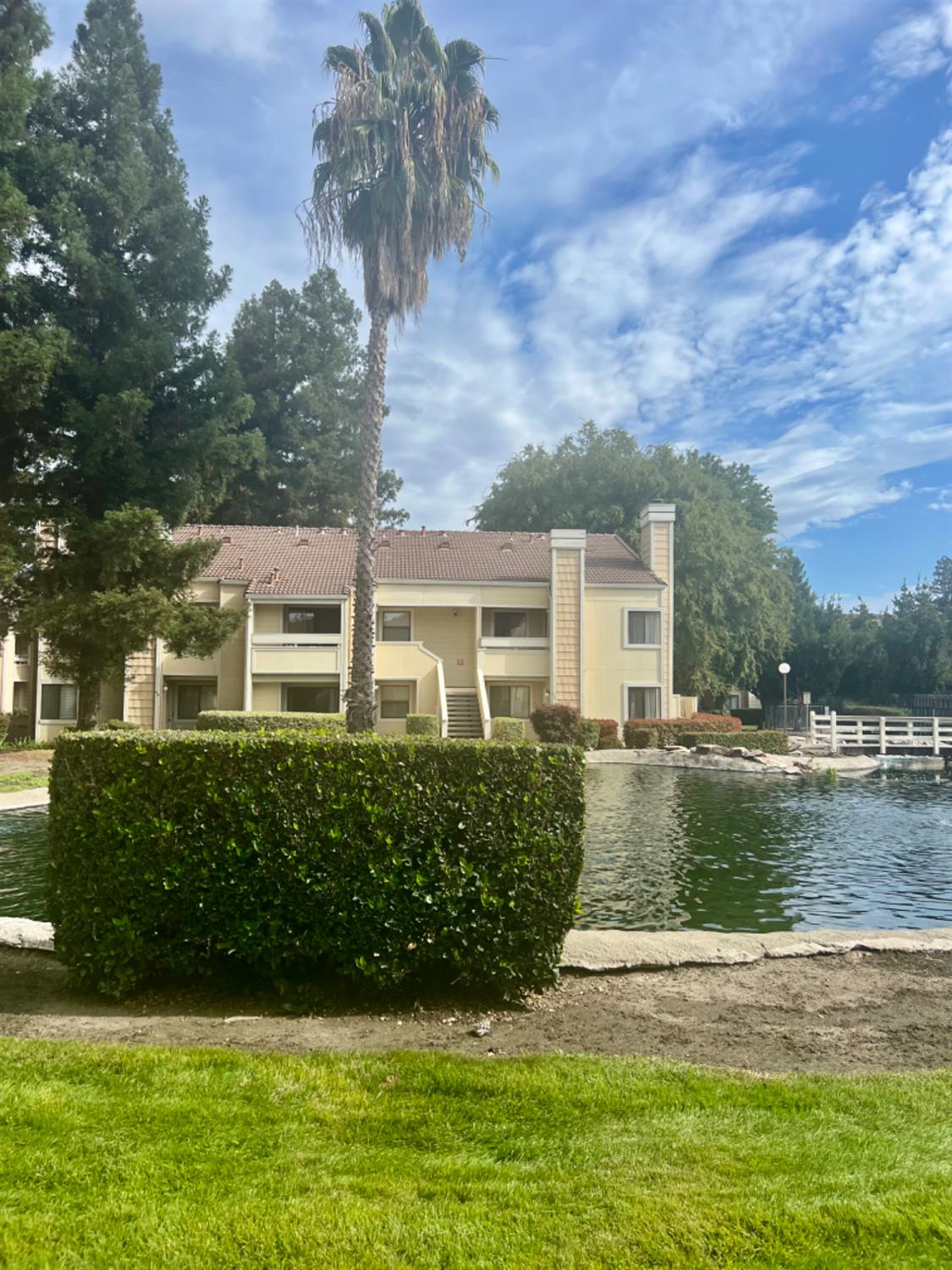 1545 Pyrenees Avenue, Unit 30 Stockton, CA 95210 - Photo 3 of 29 front view of a house with a yard
