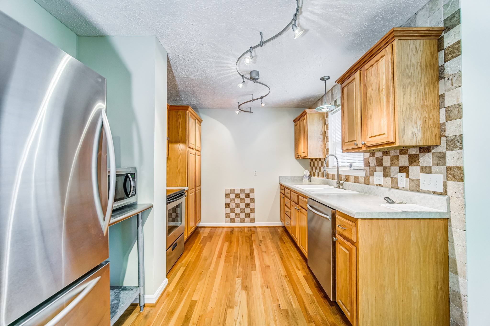 7583 Cherokee Hills Road Fairview, TN 37062 - Photo 14 of 62 a spacious bathroom with a sink a mirror a bathtub and shower