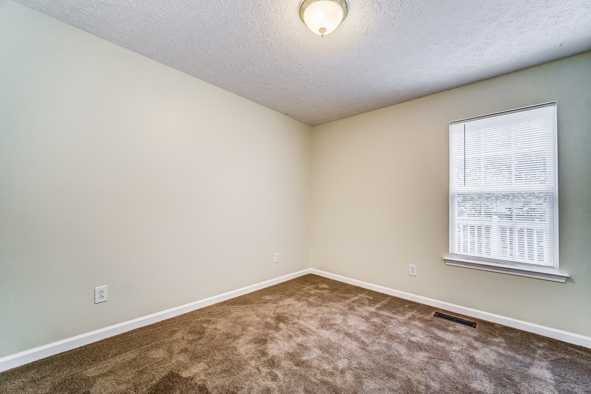 7583 Cherokee Hills Road Fairview, TN 37062 - Photo 21 of 62 an empty room with a window