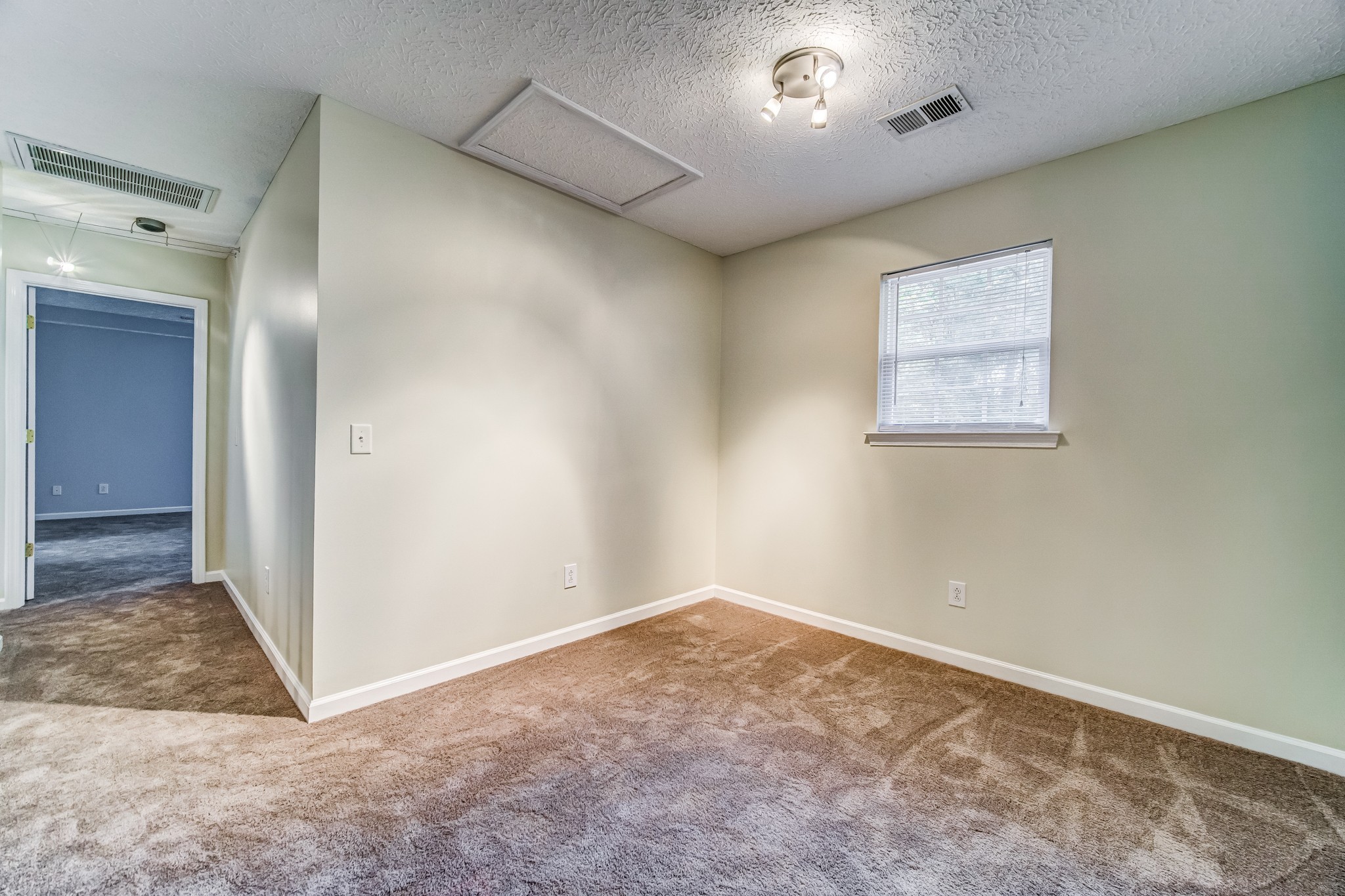 7583 Cherokee Hills Road Fairview, TN 37062 - Photo 35 of 62 an empty room with windows and closet