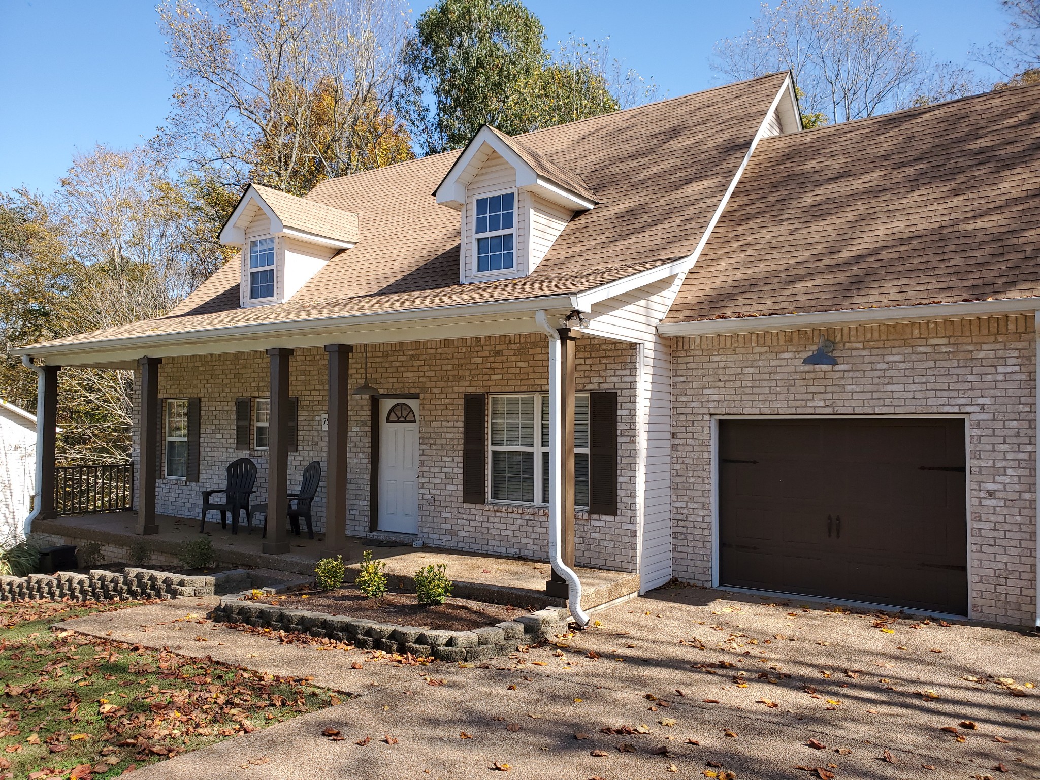 7583 Cherokee Hills Road Fairview, TN 37062 - Photo 43 of 62 a front view of a house with garden