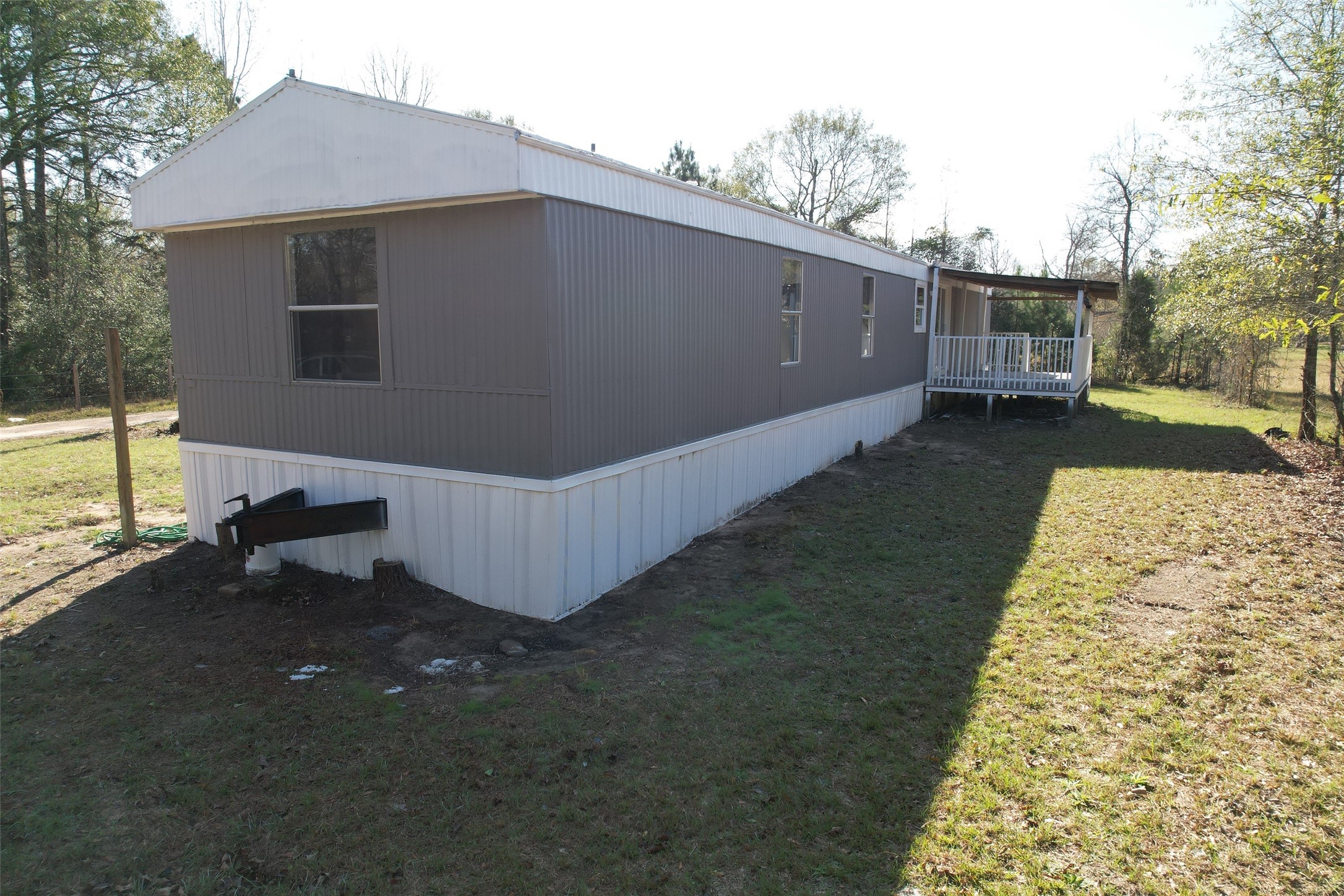 16428 Jireh Road Conroe, TX 77306 - Photo 19 of 25 a view of a house with a yard