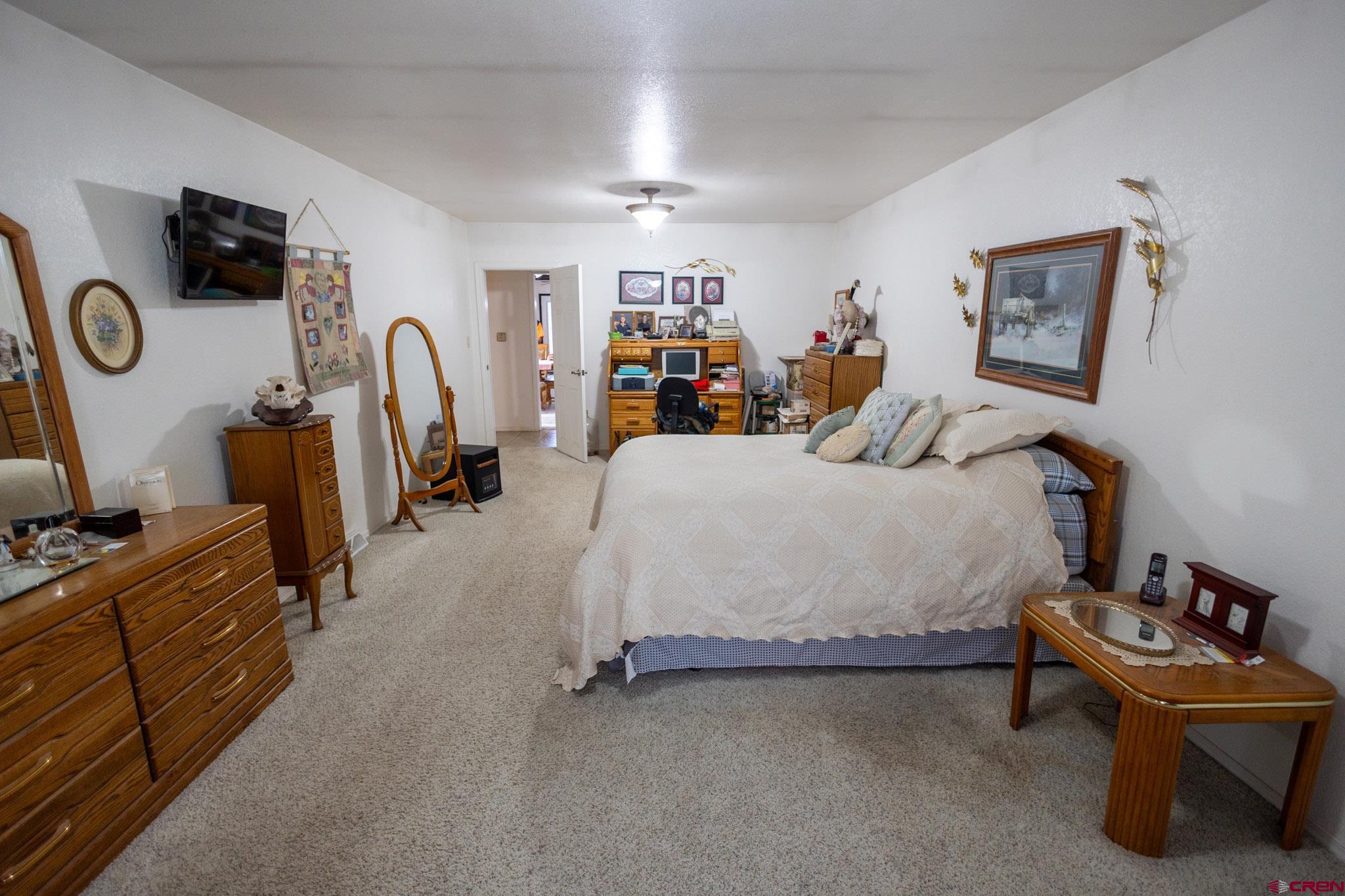 7531 High Mesa Road Olathe, CO 81425 - Photo 24 of 33 a bedroom with furniture and window