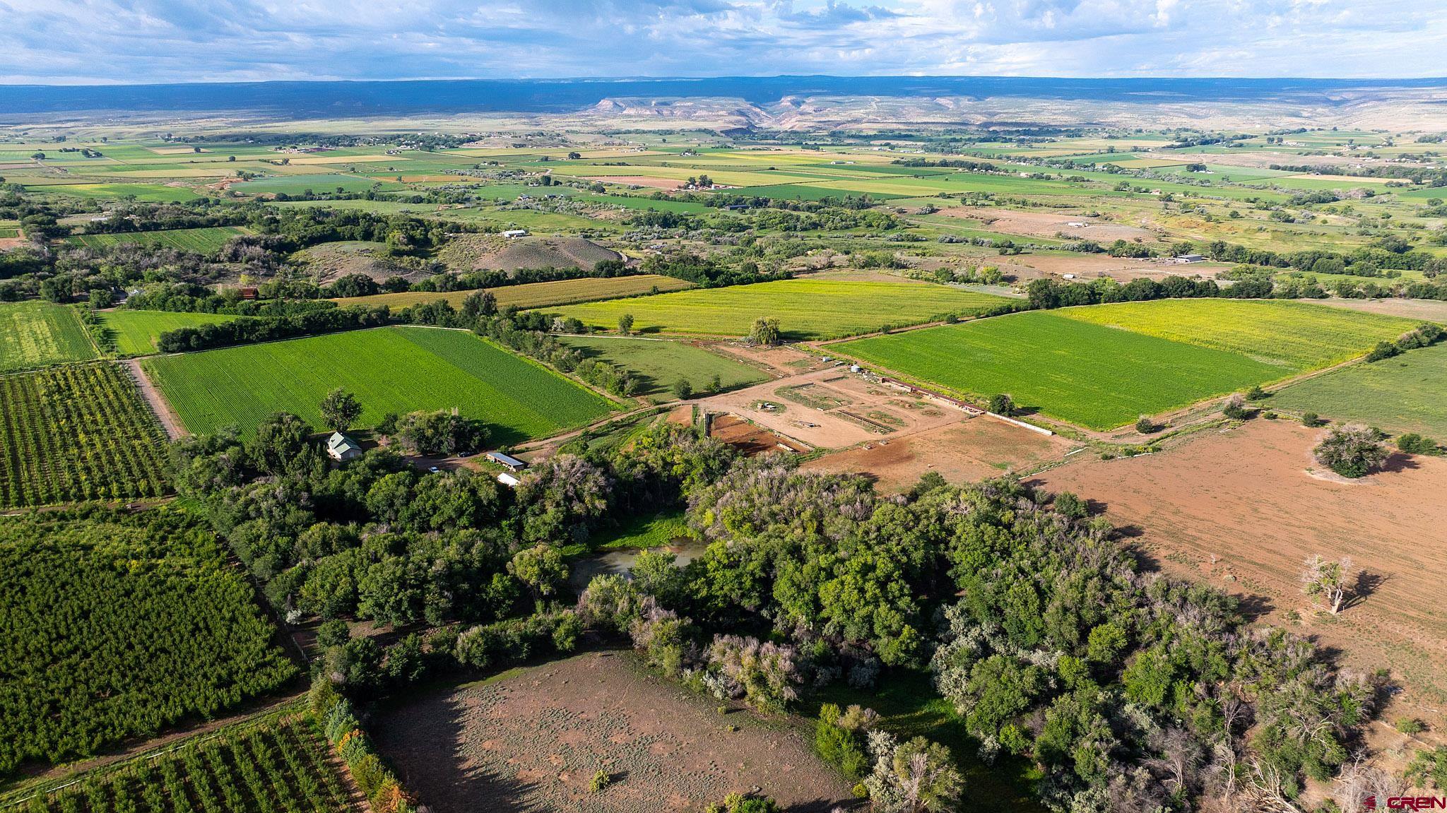 7531 High Mesa Road Olathe, CO 81425 - Photo 3 of 33 a view of a city with an ocean