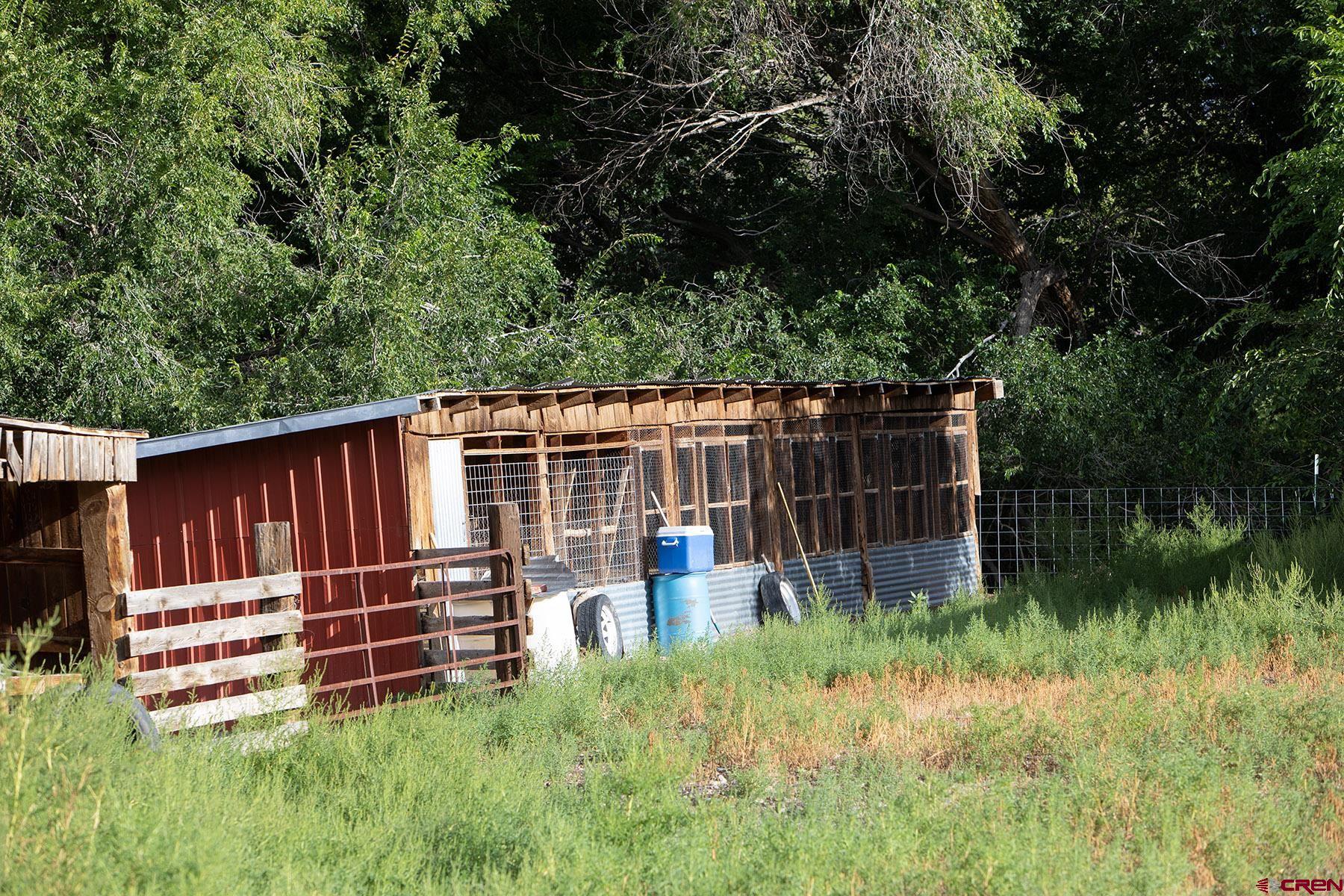 7531 High Mesa Road Olathe, CO 81425 - Photo 31 of 33 a view of backyard with deck and plants