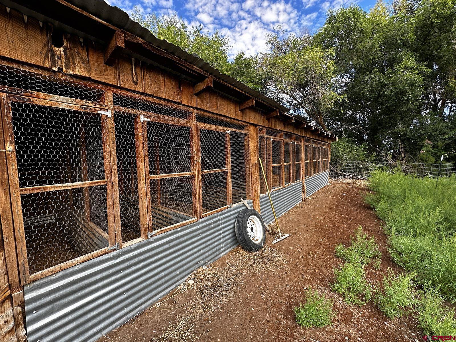7531 High Mesa Road Olathe, CO 81425 - Photo 32 of 33 a front view of a house with a yard