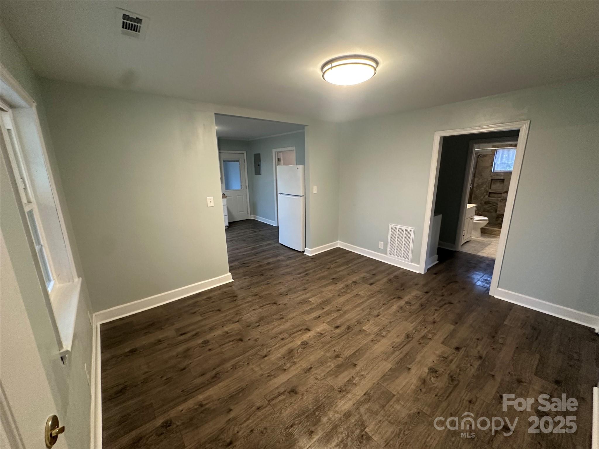 3401 Rilla Hamilton Road Monroe, NC 28110 - Photo 7 of 13 an empty room with wooden floor and closet