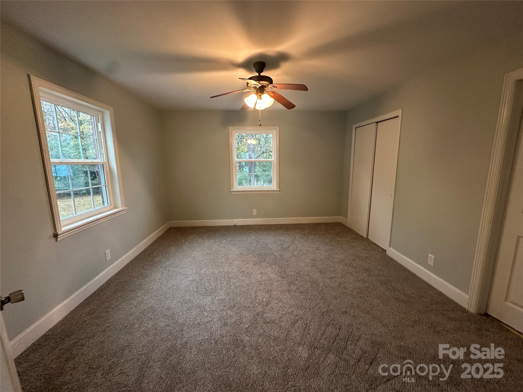 3401 Rilla Hamilton Road Monroe, NC 28110 - Photo 8 of 13 a view of room with window and ceiling fan