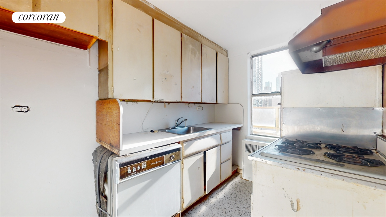 167 East 67th Street, Unit PHA Manhattan, NY 10065 - Photo 13 of 22 a kitchen with stainless steel appliances granite countertop a stove a sink and a refrigerator
