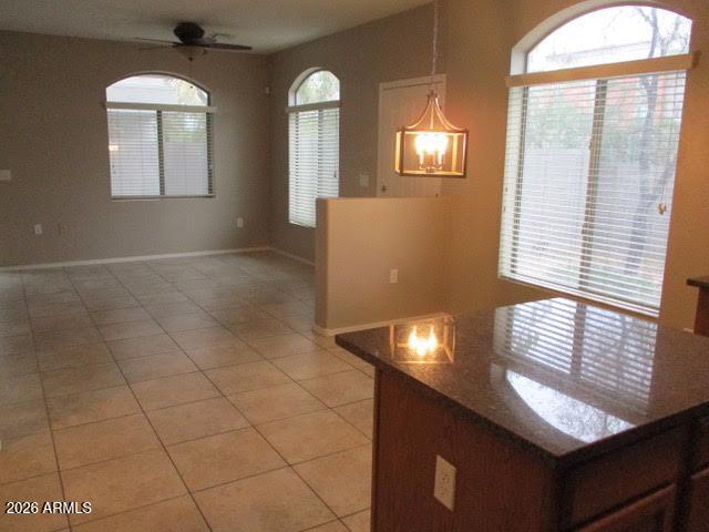 2150 West Alameda Road, Unit 1290 Phoenix, AZ 85085 - Photo 5 of 9 a view of an empty room with a window