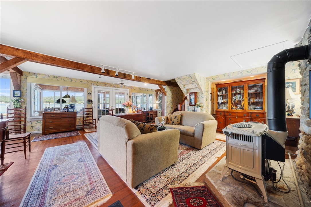 5317 West Lake Road Geneseo, NY 14454 - Photo 24 of 50 STUNNING GREAT ROOM WITH STONE & WOOD BEAMS