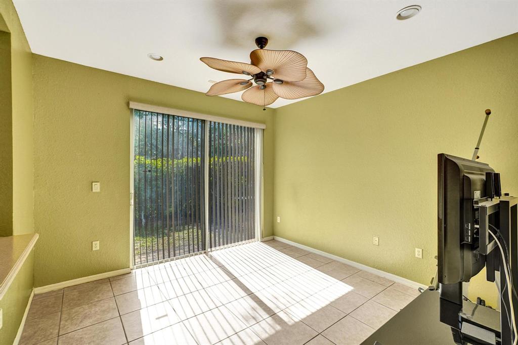 3303 Merrick Lane, Unit 1002 Margate, FL 33063 - Photo 11 of 33 a view of a room with gym equipment