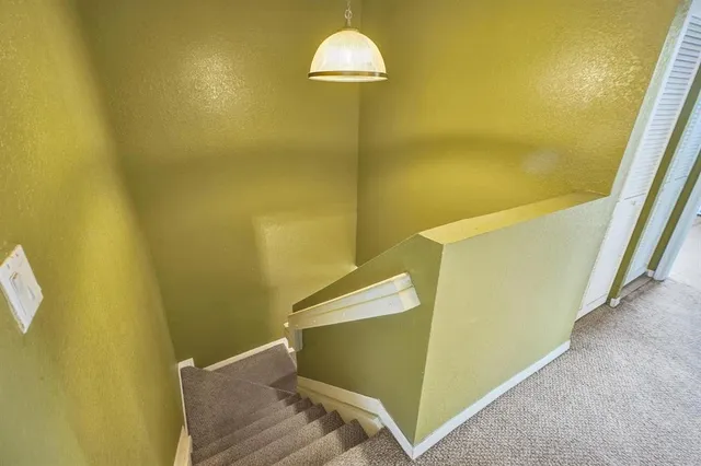 a view of a bathroom with a glass door
