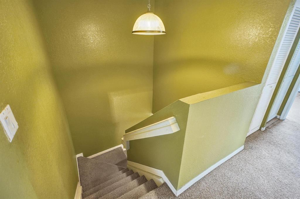 3303 Merrick Lane, Unit 1002 Margate, FL 33063 - Photo 15 of 33 a lamp on the wall next to a window