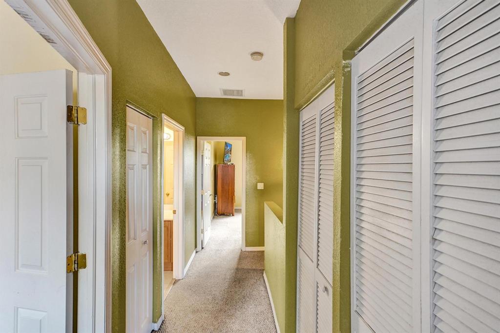 3303 Merrick Lane, Unit 1002 Margate, FL 33063 - Photo 16 of 33 a view of a bathroom with a glass door