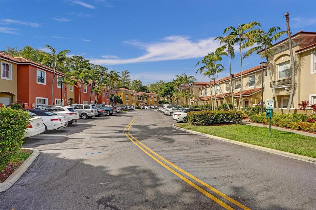 3303 Merrick Lane, Unit 1002 Margate, FL 33063 - Photo 30 of 33 a view of a street with a building in the background