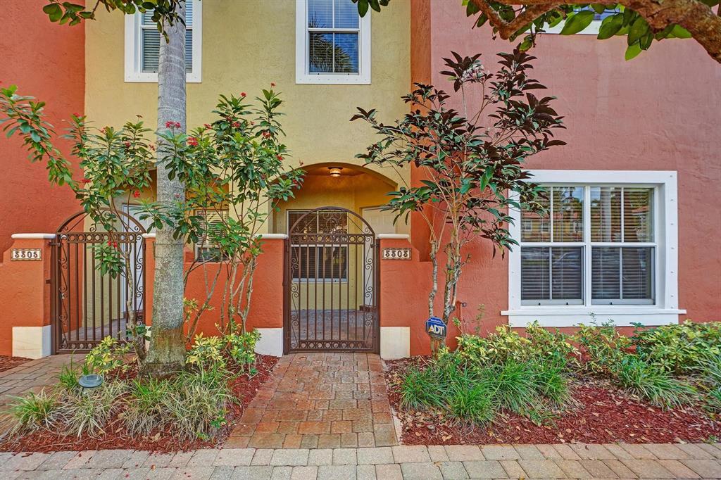 3303 Merrick Lane, Unit 1002 Margate, FL 33063 - Photo 3 of 33 front view of a house with a yard