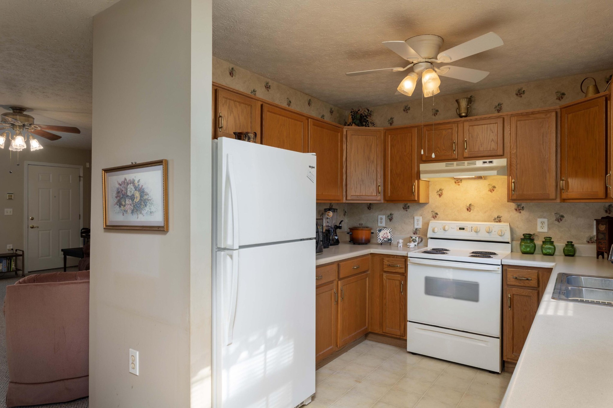201 Broyles Road Spring City, TN 37381 - Photo 12 of 34 a white refrigerator freezer and a stove top oven