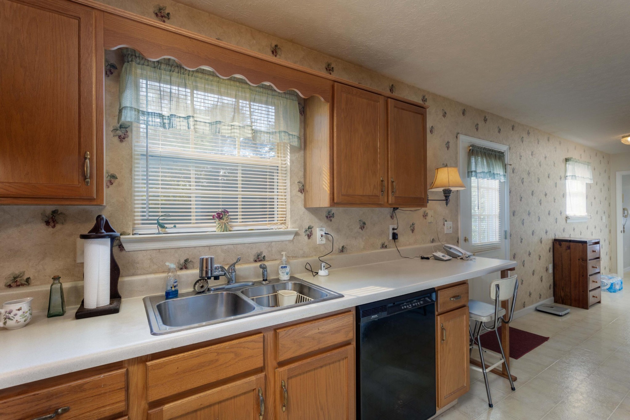 201 Broyles Road Spring City, TN 37381 - Photo 13 of 34 a kitchen with a sink cabinets and window