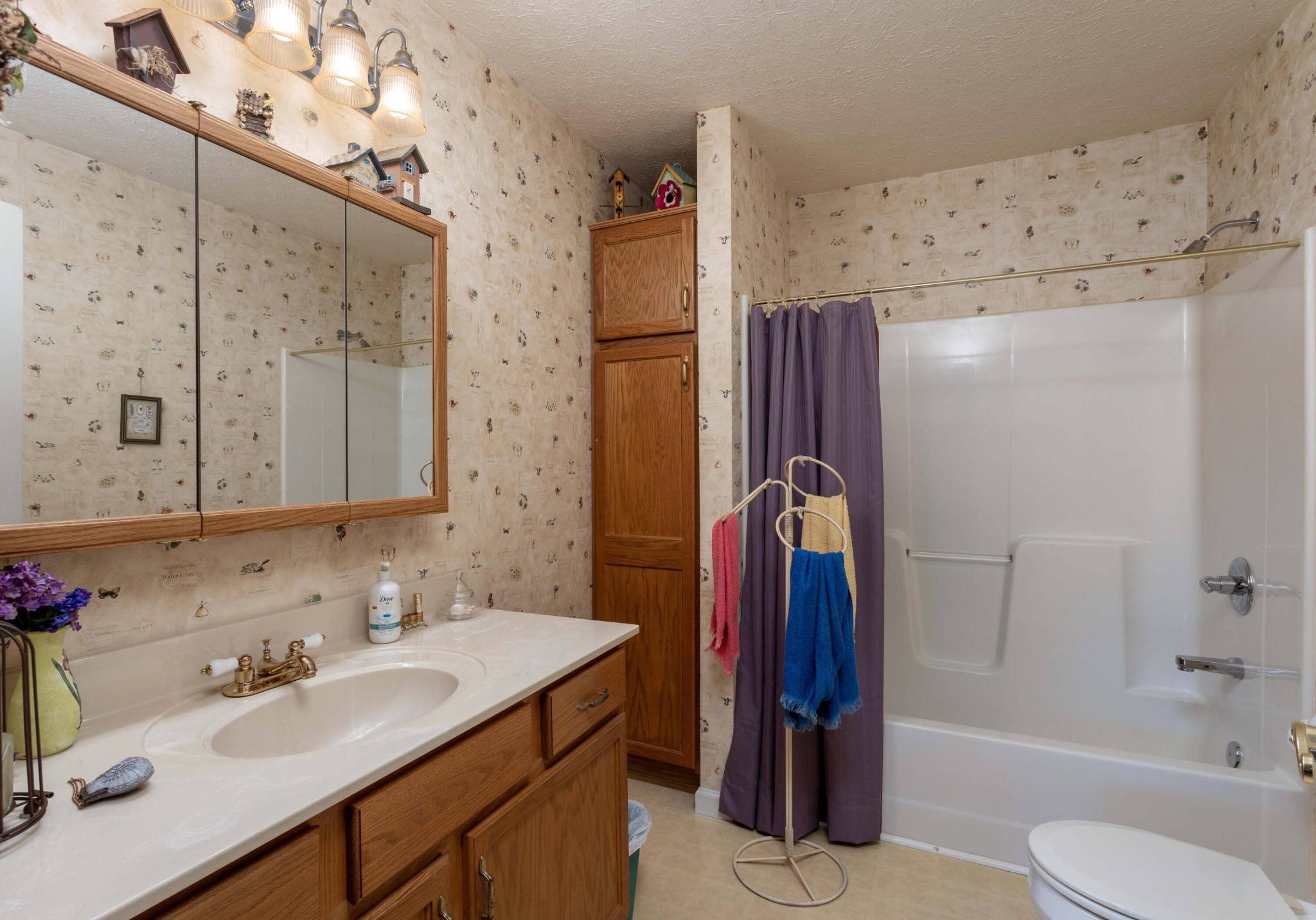 201 Broyles Road Spring City, TN 37381 - Photo 20 of 34 a bathroom with a sink a toilet and shower