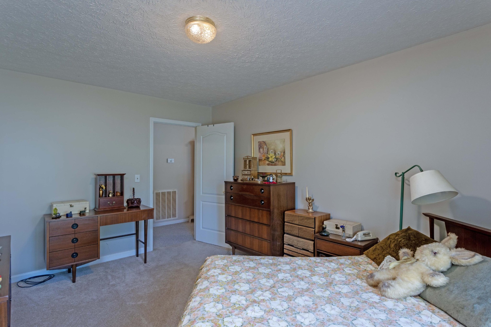 201 Broyles Road Spring City, TN 37381 - Photo 23 of 34 a bedroom with a bed and furniture