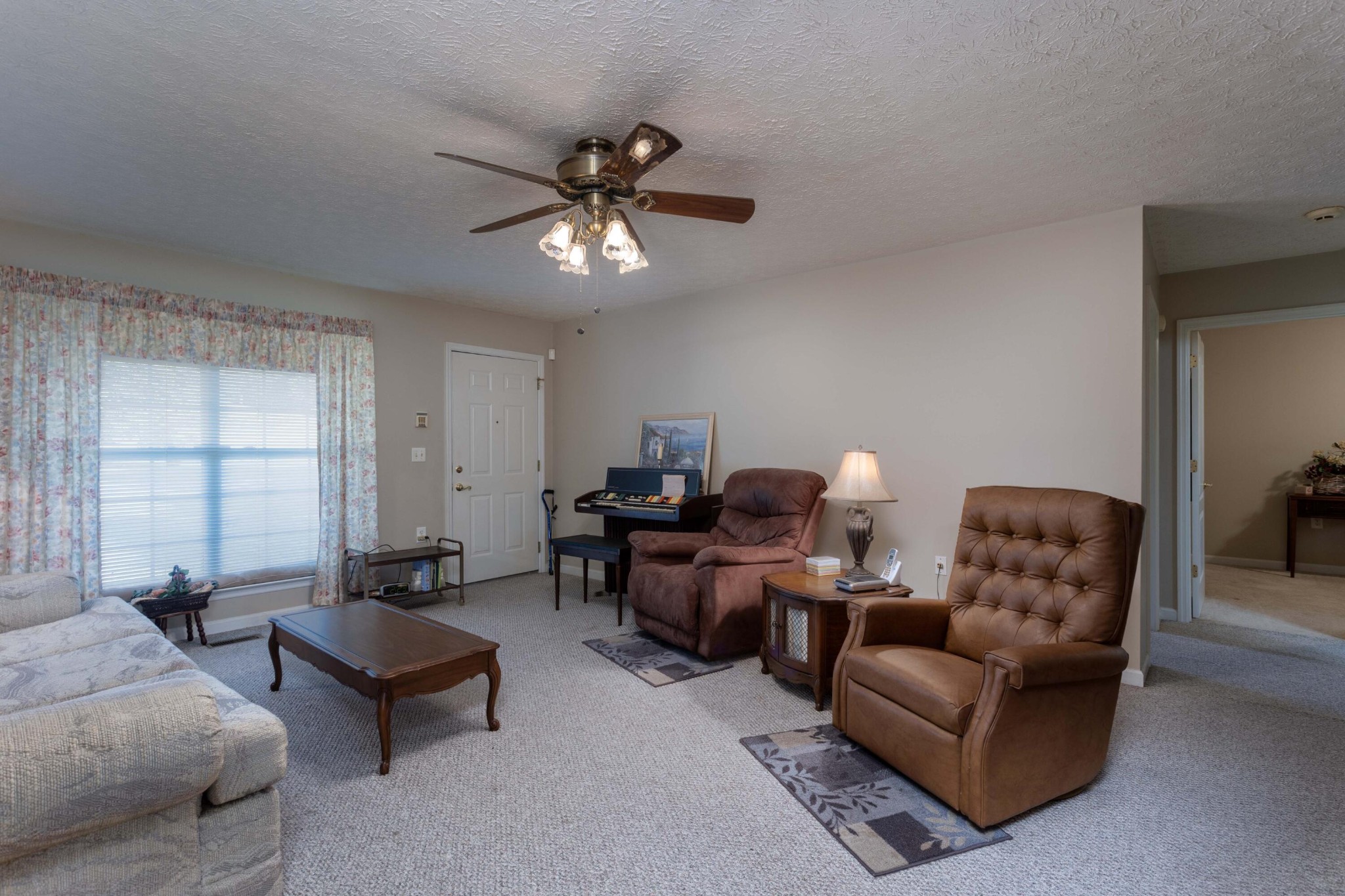 201 Broyles Road Spring City, TN 37381 - Photo 7 of 34 a living room with furniture and a large window