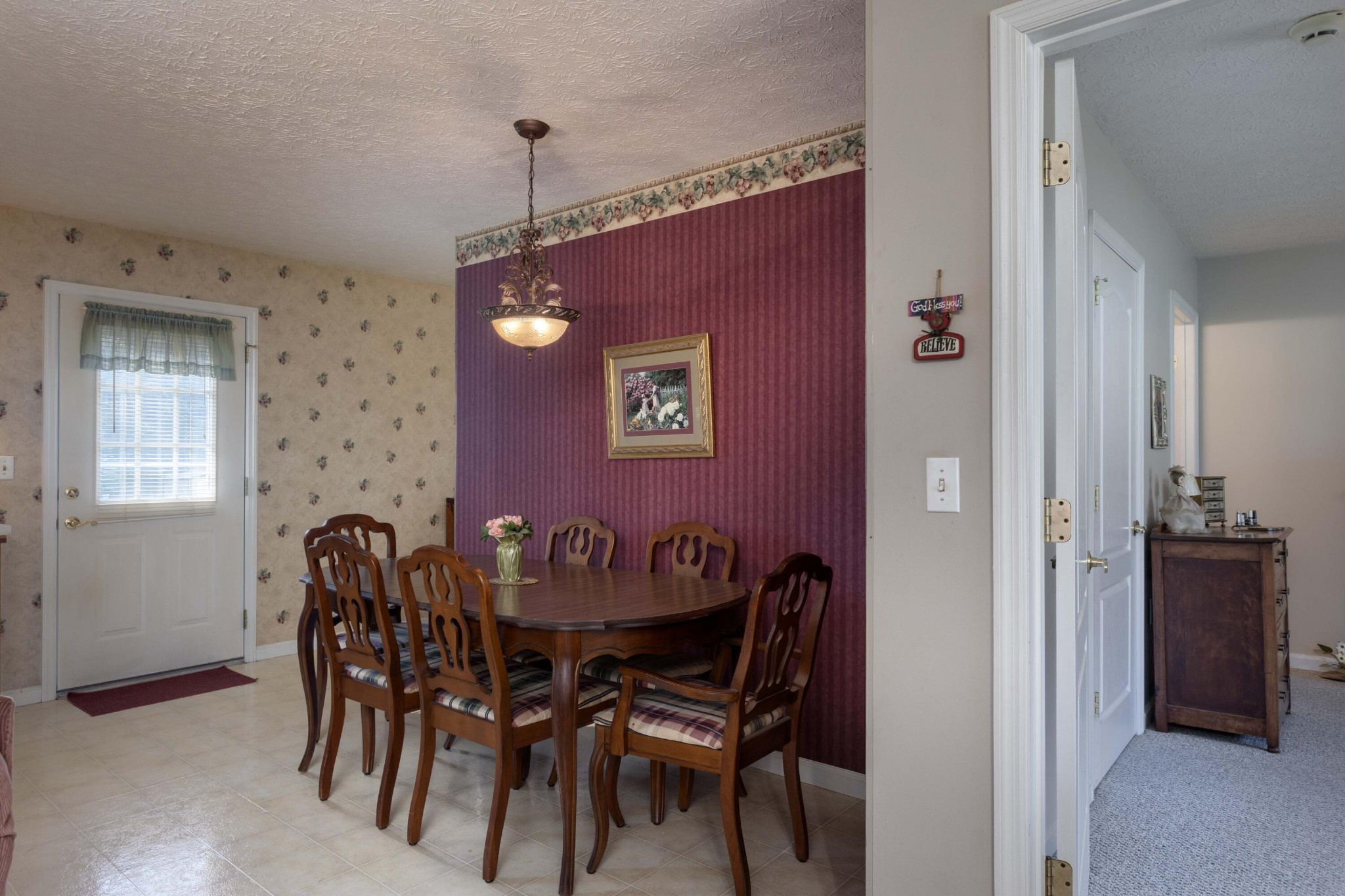 201 Broyles Road Spring City, TN 37381 - Photo 9 of 34 a view of a dining room with furniture and chandelier