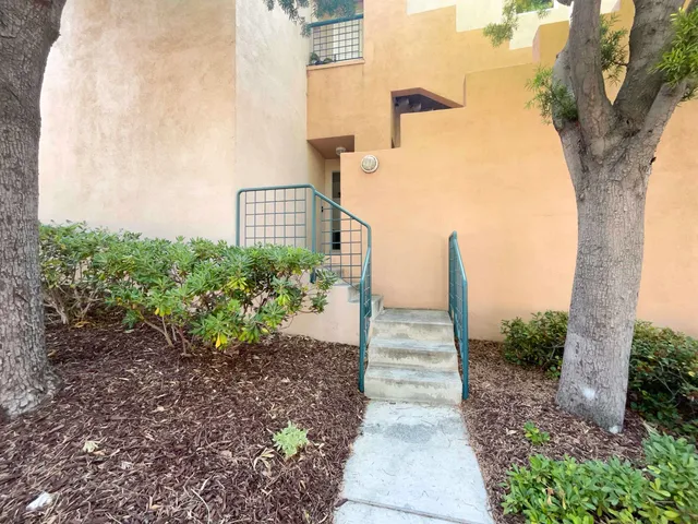 a view of a pathway both side of building