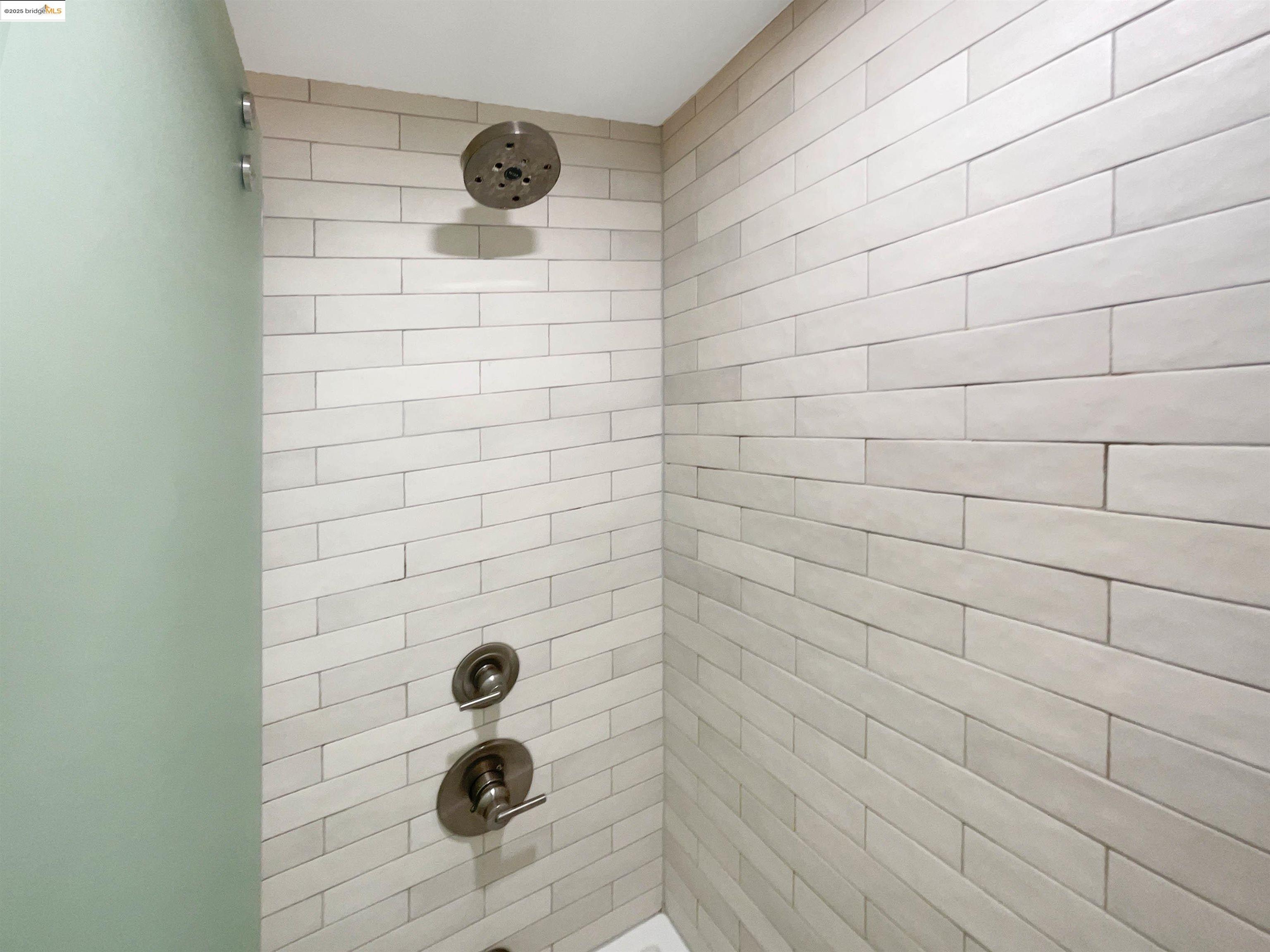 991 Asilomar Terrace, Unit 1 Sunnyvale, CA 94086 - Photo 17 of 20 Bathroom with bathing tub / shower combination