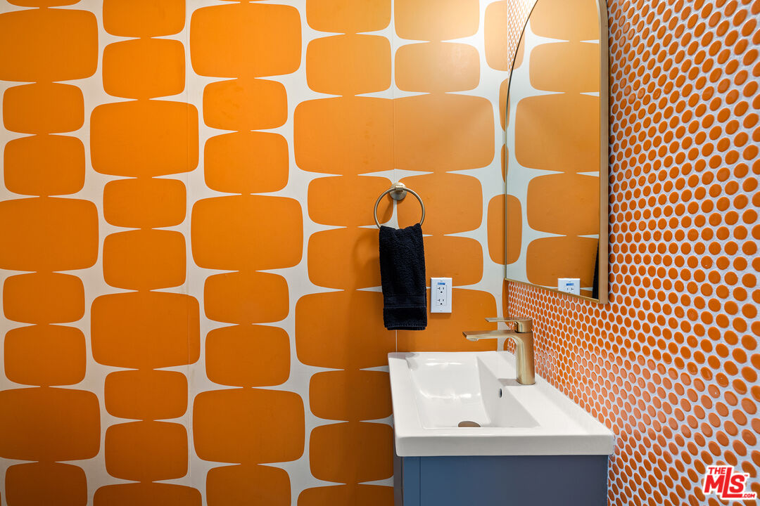 74085 Setting Sun Trail Palm Desert, CA 92260 - Photo 31 of 57 a bathroom with a sink and a shower